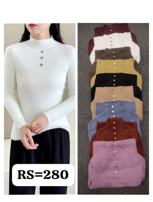 Beige ribbed sweater worn by a person on the left, with a stack of various colored sweaters on the right.