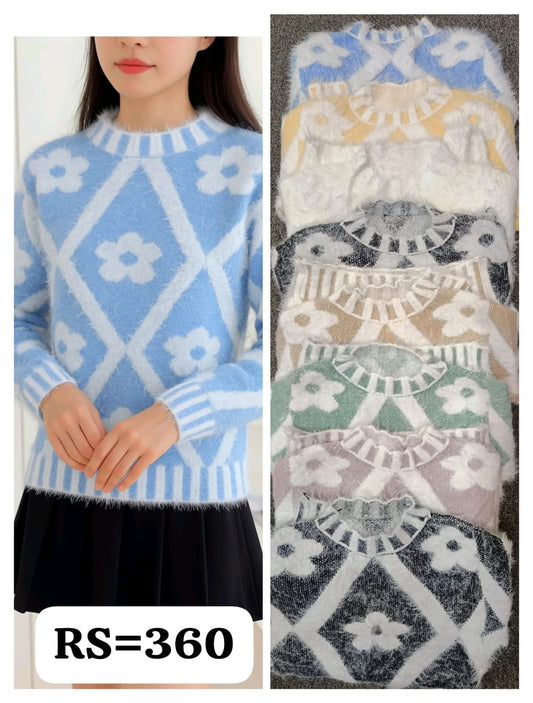 Fuzzy heart-pattern crewneck in pink—cozy winter knit with a soft, feminine vibe.