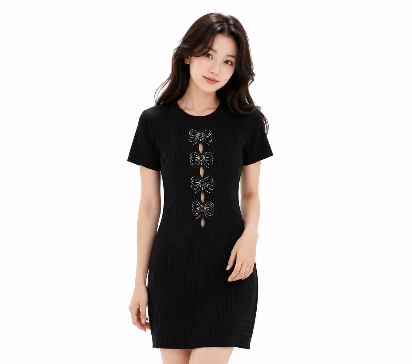A woman modeling a black short-sleeve ribbed knit dress with a vertical decorative cutout and bow-like embellishment on the front, photographed against a plain white studio background.