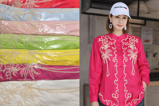 Colorful fabric swatches with floral patterns and a person wearing a pink embroidered shirt.